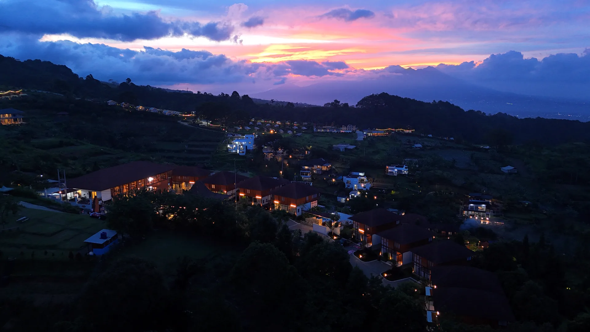 Villa Top View at dusk, lights on across the valley